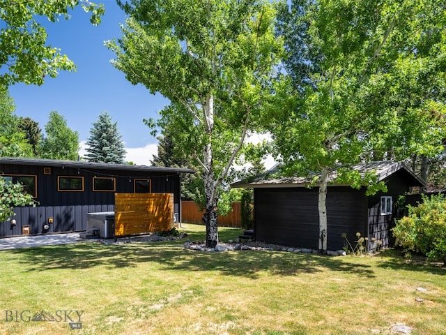 1206 N Cedarview Dr, Bozeman, MT 59715 - view of front of property with an outdoor structure and board and batten siding