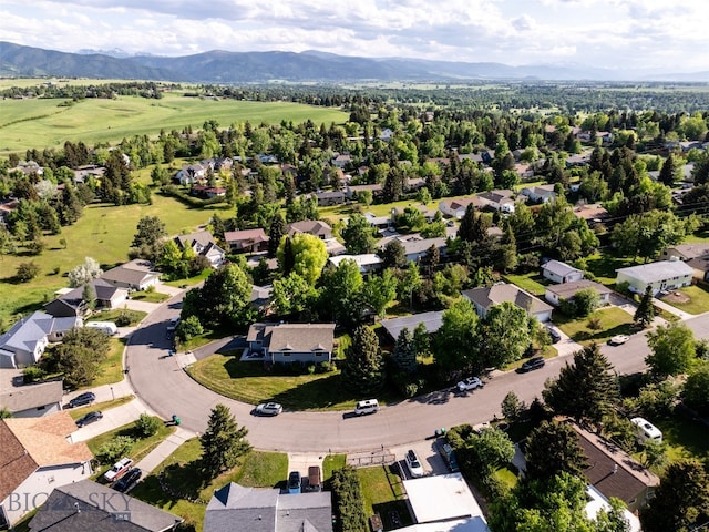 1206 N Cedarview Dr, Bozeman, MT 59715 - aerial overview of property's location featuring mountains and nearby suburban area