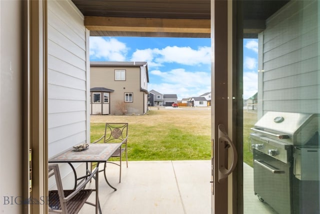 1308 Scooter Ln, Belgrade, MT 59714 - view of patio featuring grilling area and a residential view