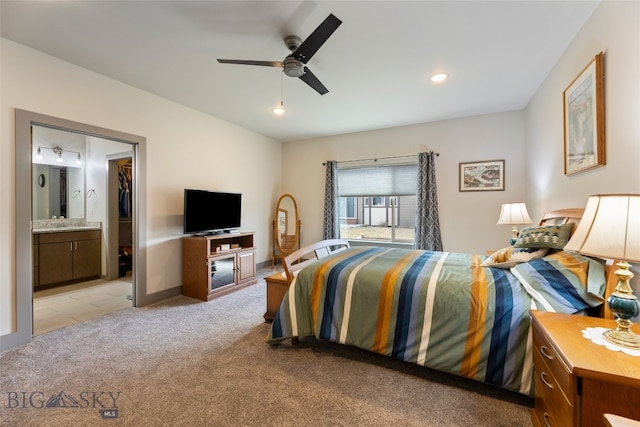 1308 Scooter Ln, Belgrade, MT 59714 - bedroom with light carpet, ensuite bathroom, recessed lighting, and a ceiling fan
