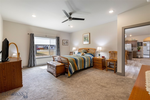 1308 Scooter Ln, Belgrade, MT 59714 - bedroom featuring light colored carpet, freestanding refrigerator, recessed lighting, and ceiling fan