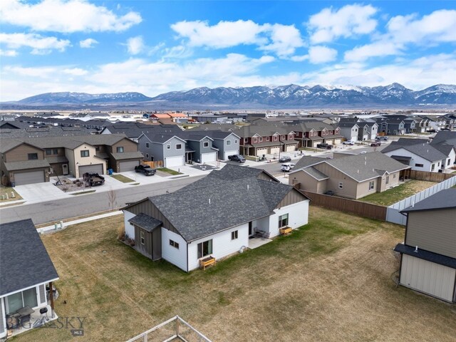 1308 Scooter Ln, Belgrade, MT 59714 - aerial view of residential area with a mountainous background