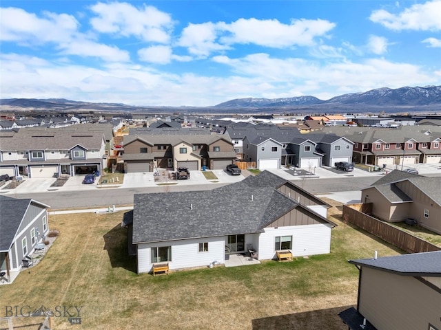 1308 Scooter Ln, Belgrade, MT 59714 - aerial perspective of suburban area with a mountain backdrop