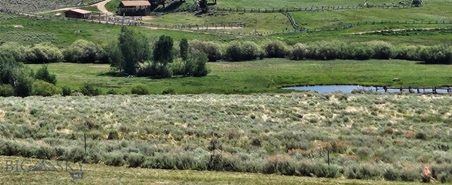 950 White Creek Ln, Polaris, MT 59746 - view of yard featuring a rural view and a water view