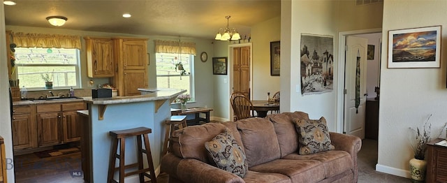 950 White Creek Ln, Polaris, MT 59746 - living room with a chandelier, plenty of natural light, and recessed lighting