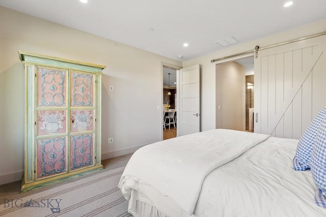 20 Caymus Ln Unit D, Bozeman, MT 59718 - bedroom featuring recessed lighting and a barn door