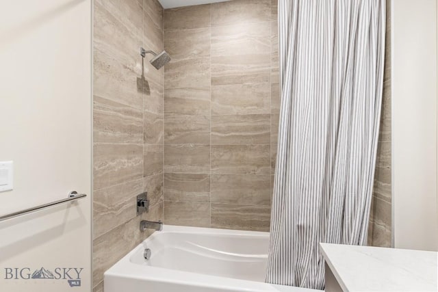 20 Caymus Ln Unit D, Bozeman, MT 59718 - bathroom featuring shower / bath combo with shower curtain and vanity