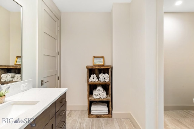 20 Caymus Ln Unit D, Bozeman, MT 59718 - bathroom featuring vanity and recessed lighting