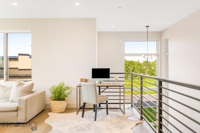 20 Caymus Ln Unit D, Bozeman, MT 59718 - home office featuring healthy amount of natural light, wood finished floors, recessed lighting, and a chandelier