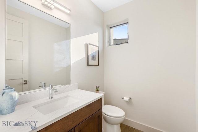 20 Caymus Ln Unit D, Bozeman, MT 59718 - bathroom featuring vanity and wood finished floors