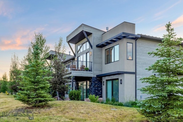 20 Caymus Ln Unit D, Bozeman, MT 59718 - rear view of property with a balcony and a yard