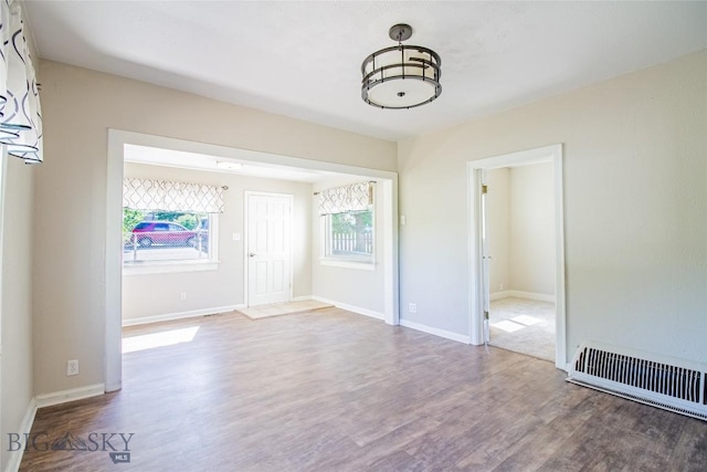 1823 Lafayette, Butte, MT 59701 - unfurnished room with wood finished floors and baseboards
