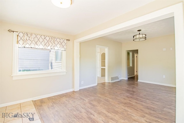 1823 Lafayette, Butte, MT 59701 - spare room featuring wood finished floors and baseboards