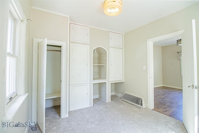 1823 Lafayette, Butte, MT 59701 - unfurnished bedroom featuring light colored carpet, heating unit, and a closet