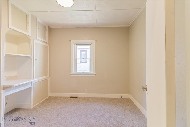 1823 Lafayette, Butte, MT 59701 - spare room featuring light colored carpet and ornamental molding