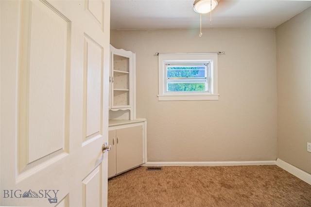 1823 Lafayette, Butte, MT 59701 - unfurnished room featuring light carpet and baseboards