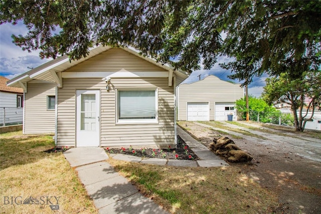 1823 Lafayette, Butte, MT 59701 - view of front of property featuring an outdoor structure and a garage