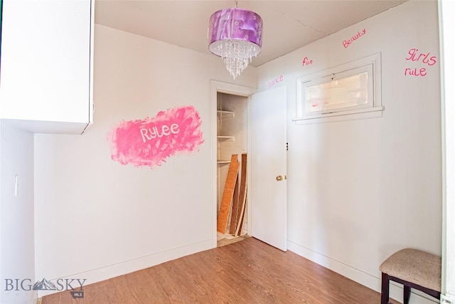 1823 Lafayette, Butte, MT 59701 - empty room featuring wood finished floors and a chandelier