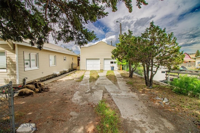 1823 Lafayette, Butte, MT 59701 - view of front facade featuring an outbuilding and a garage
