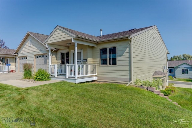 513 Burnham Pl, Helena, MT 59601 - view of front facade with a porch, a front yard, an attached garage, and driveway