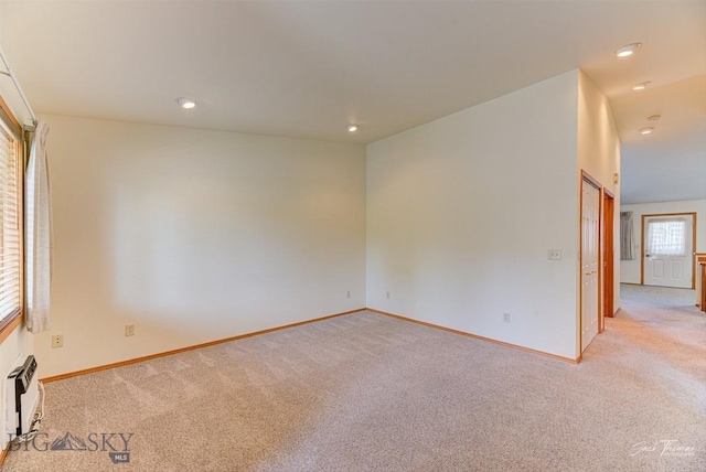 513 Burnham Pl, Helena, MT 59601 - spare room with light carpet and recessed lighting