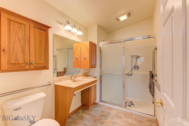 513 Burnham Pl, Helena, MT 59601 - full bathroom featuring vanity, a shower stall, and vaulted ceiling
