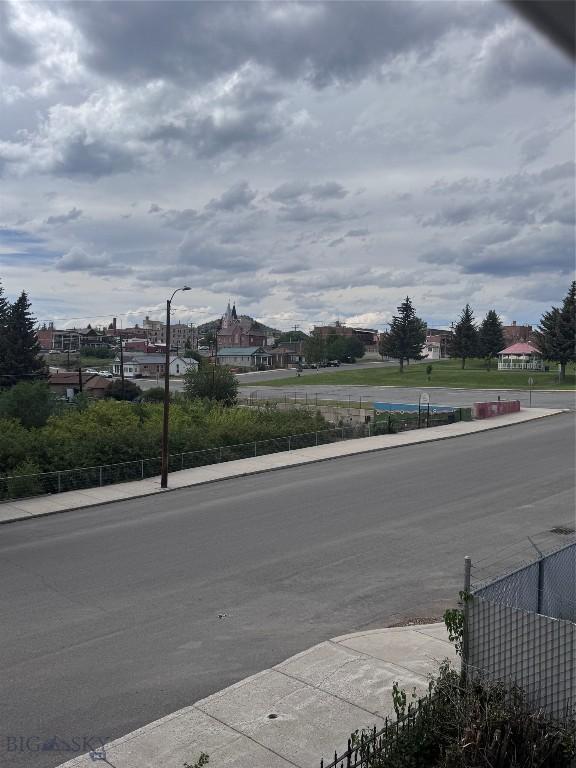 422 S Colorado, Butte, MT 59701 - view of asphalt street featuring sidewalks, street lighting, and curbs