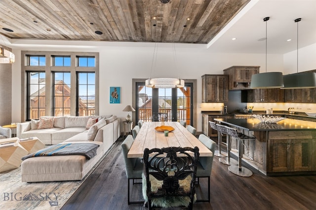 77 Tanager Frk Unit 29, Big Sky, MT 59716 - dining space with dark wood-type flooring, wooden ceiling, recessed lighting, and french doors