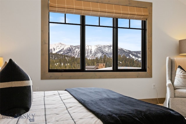 77 Tanager Frk Unit 29, Big Sky, MT 59716 - bedroom with a mountain view