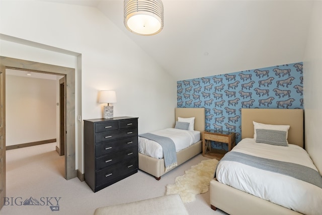 77 Tanager Frk Unit 29, Big Sky, MT 59716 - carpeted bedroom with wallpapered walls and vaulted ceiling