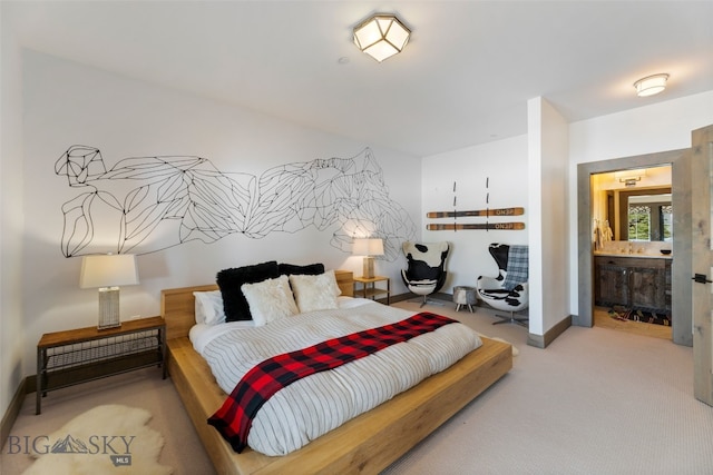 77 Tanager Frk Unit 29, Big Sky, MT 59716 - carpeted bedroom featuring baseboards and connected bathroom