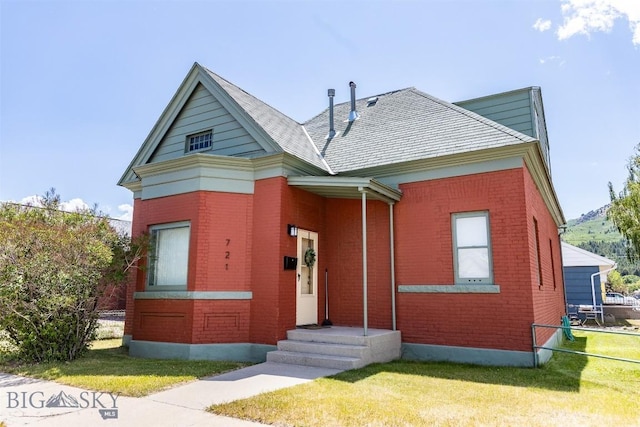 721 W Park Ave, Anaconda, MT 59711 - view of front of house featuring brick siding and a front yard