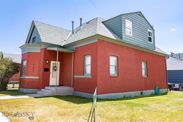 721 W Park Ave, Anaconda, MT 59711 - view of front of property with brick siding and a front yard