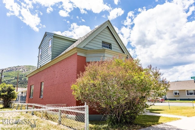 721 W Park Ave, Anaconda, MT 59711 - view of side of property featuring brick siding