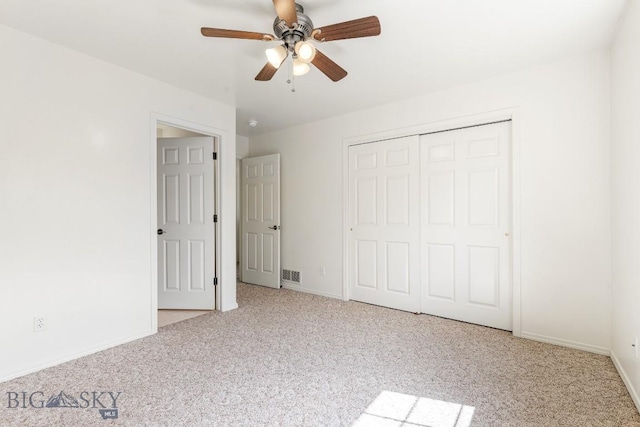 605 Prairie Ave, Bozeman, MT 59718 - unfurnished bedroom featuring carpet floors, a closet, and a ceiling fan