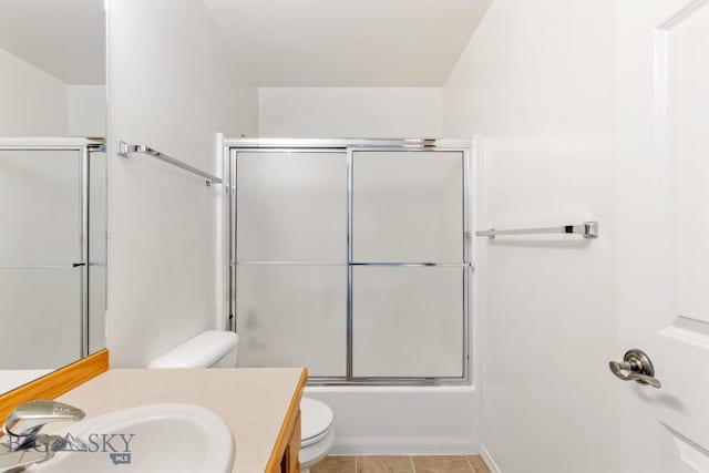 605 Prairie Ave, Bozeman, MT 59718 - full bath with vanity, enclosed tub / shower combo, and tile patterned flooring