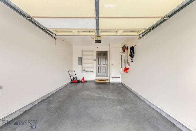 605 Prairie Ave, Bozeman, MT 59718 - garage with electric panel and a garage door opener