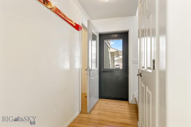 605 Prairie Ave, Bozeman, MT 59718 - doorway to outside featuring light wood-style floors and baseboards