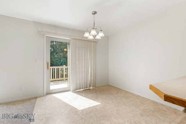 605 Prairie Ave, Bozeman, MT 59718 - unfurnished room with a chandelier and baseboards