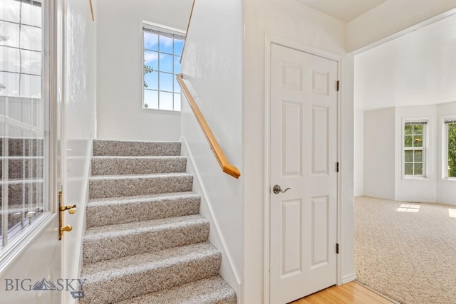 605 Prairie Ave, Bozeman, MT 59718 - staircase featuring healthy amount of natural light and wood finished floors