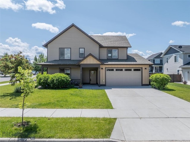 56 Koch Peak Ct, Bozeman, MT 59718 - craftsman house featuring board and batten siding, driveway, a front lawn, and a shingled roof