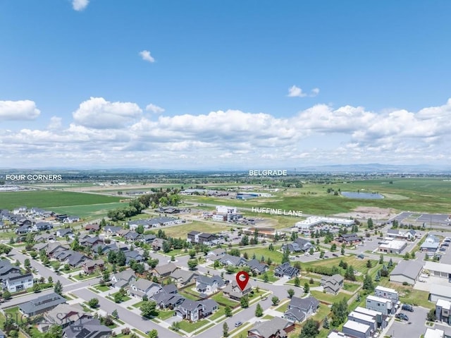 56 Koch Peak Ct, Bozeman, MT 59718 - aerial overview of property's location with a large body of water and nearby suburban area