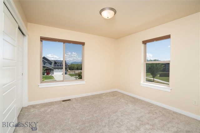 56 Koch Peak Ct, Bozeman, MT 59718 - carpeted empty room with baseboards