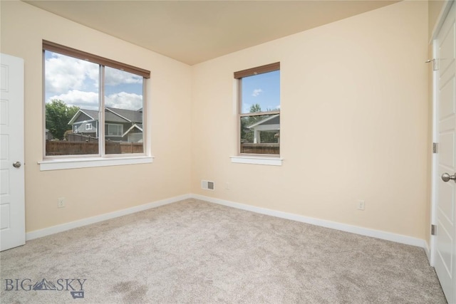56 Koch Peak Ct, Bozeman, MT 59718 - unfurnished room with carpet and baseboards