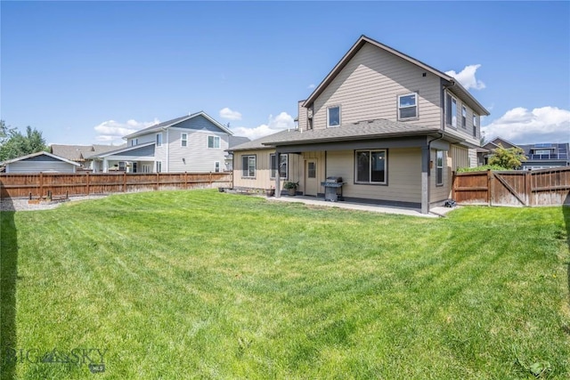 56 Koch Peak Ct, Bozeman, MT 59718 - back of property with a patio area and a fenced backyard
