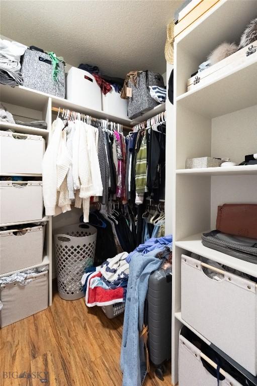 911 N Aster, Bozeman, MT 59718 - spacious closet featuring wood finished floors