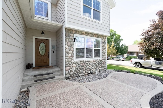 911 N Aster, Bozeman, MT 59718 - view of exterior entry featuring stone siding