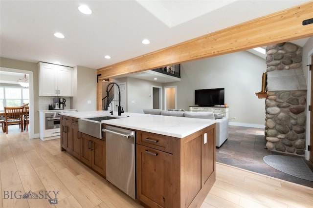 911 N Aster, Bozeman, MT 59718 - kitchen with dishwasher, white cabinetry, light countertops, light wood-type flooring, and recessed lighting