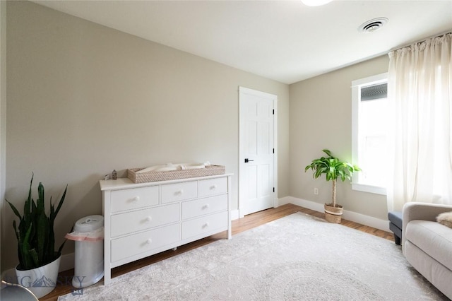 911 N Aster, Bozeman, MT 59718 - living area featuring light wood-style floors and baseboards