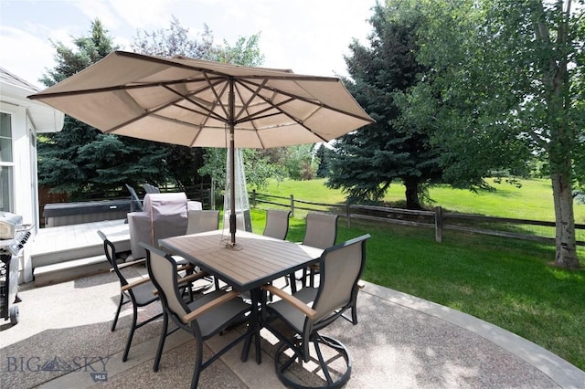 911 N Aster, Bozeman, MT 59718 - view of patio featuring a hot tub and outdoor dining area